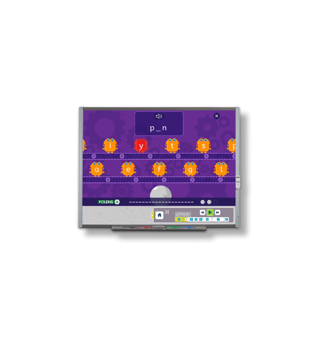 Folens Spell It! digital resource on an interactive whiteboard showing a fun phonics-based spelling game with animated letters.